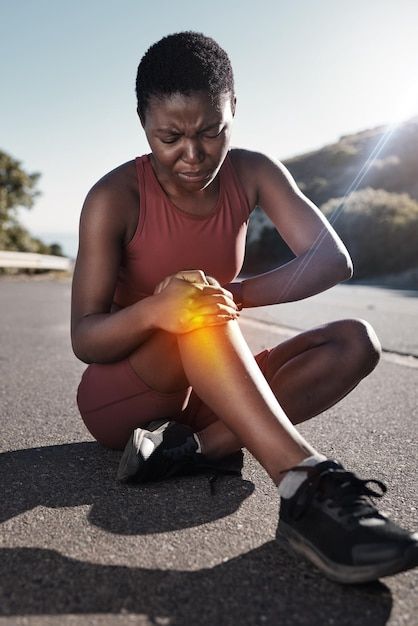 Woman attending to her Leg Pain